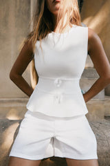 TOP EN MAILLE PÉPLUM AVEC LACETS