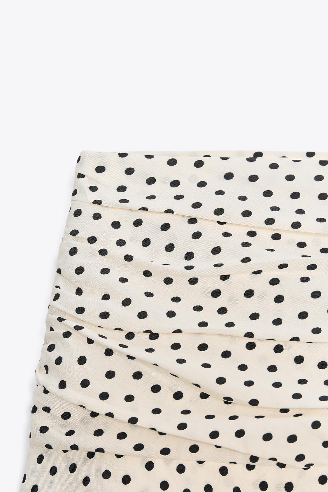 JUPE-CULOTTE À VOLANTS