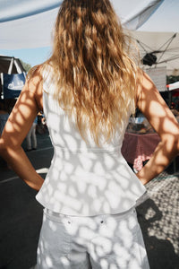 TOP EN MAILLE PÉPLUM AVEC LACETS