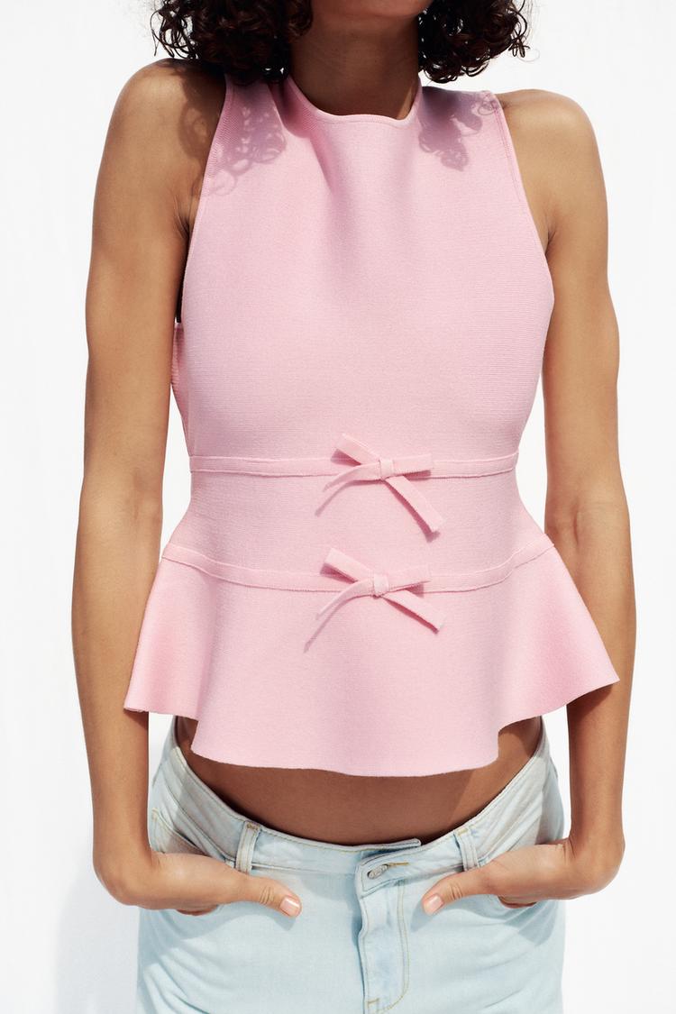 TOP EN MAILLE PÉPLUM AVEC LACETS