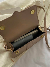 Sac à main avec sangle plissé -