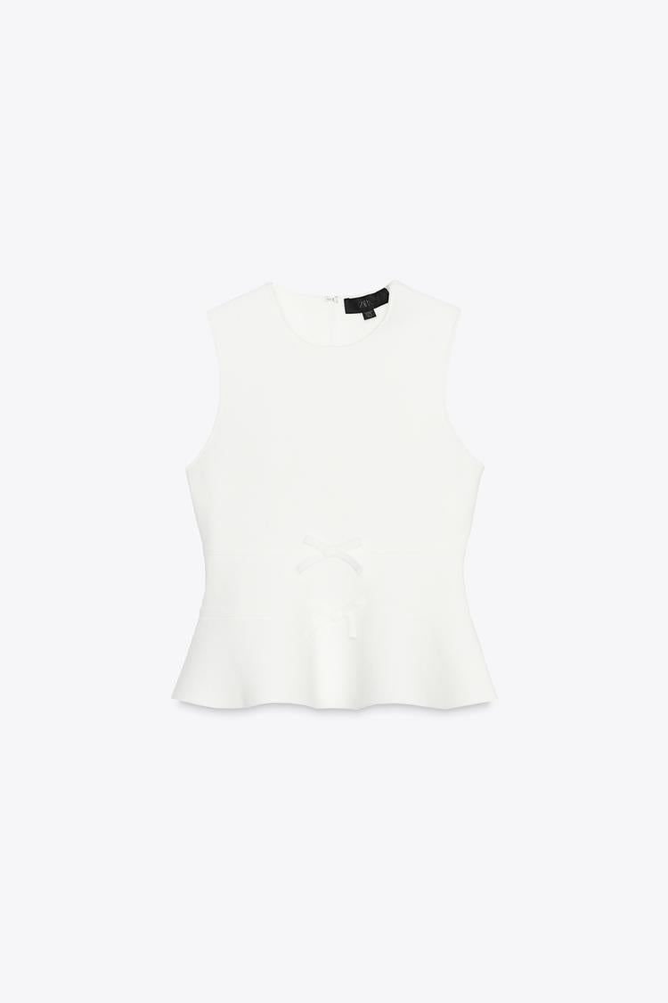 TOP EN MAILLE PÉPLUM AVEC LACETS
