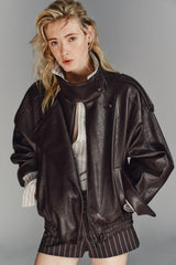 BLOUSON EN MATIÈRE SYNTHÉTIQUE