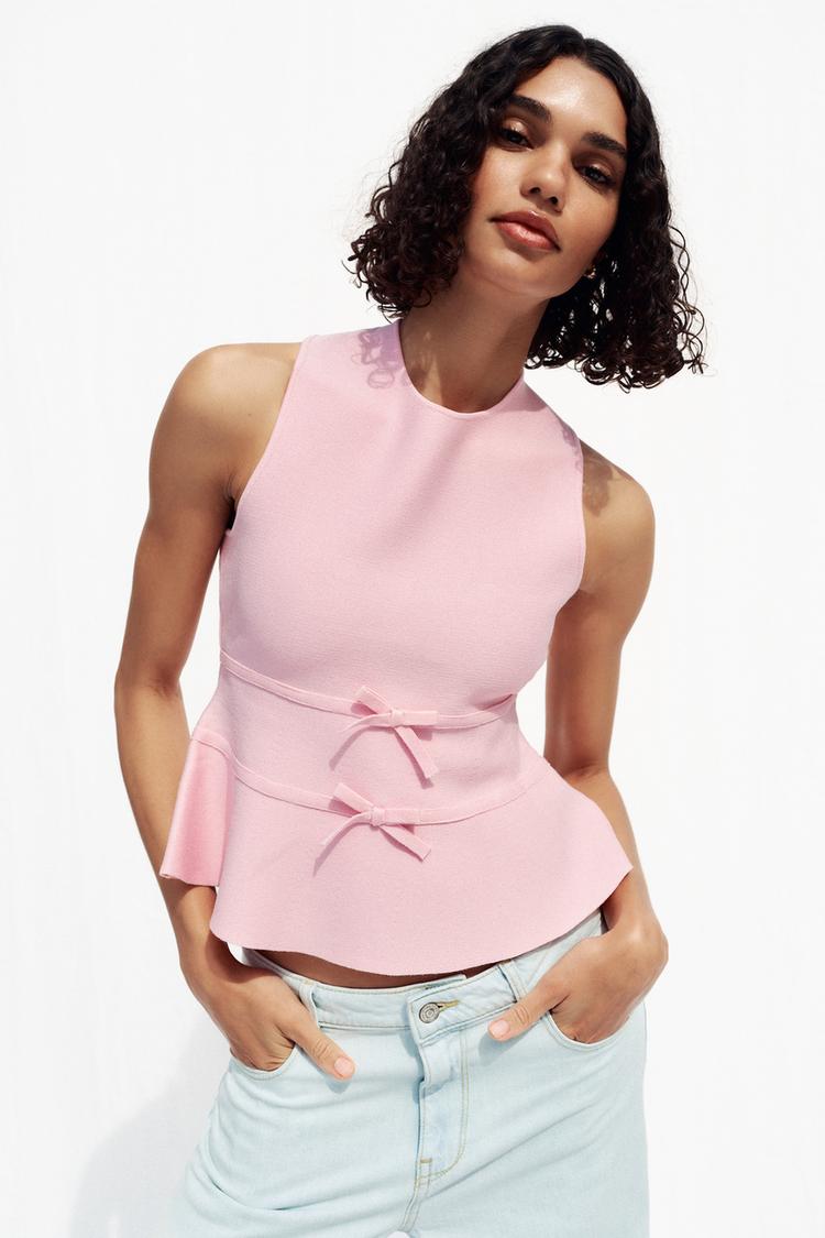 TOP EN MAILLE PÉPLUM AVEC LACETS