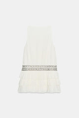 ROBE GAZE VOLANTS CLOUS