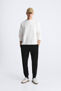 PANTALON DÉLAVÉ AVEC TAILLE JOGGING