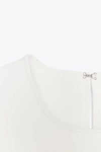 TOP EN MAILLE PÉPLUM AVEC LACETS