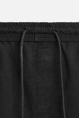 PANTALON DÉLAVÉ AVEC TAILLE JOGGING