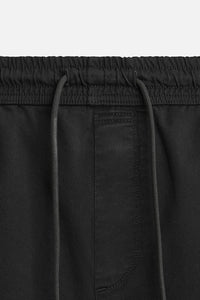 PANTALON DÉLAVÉ AVEC TAILLE JOGGING