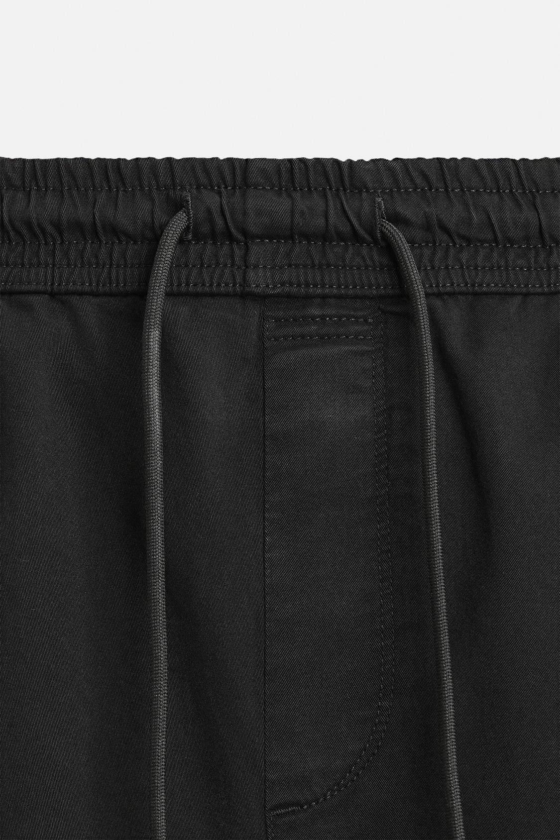 PANTALON DÉLAVÉ AVEC TAILLE JOGGING