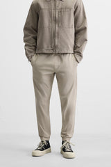 PANTALON DÉLAVÉ AVEC TAILLE JOGGING