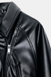BLOUSON EN MATIÈRE SYNTHÉTIQUE AVEC CEINTURE