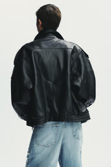 BLOUSON EN MATIÈRE SYNTHÉTIQUE