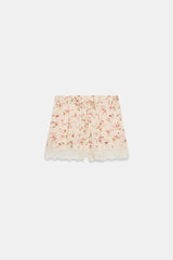 SHORT À IMPRIMÉ FLEURI ET DENTELLE