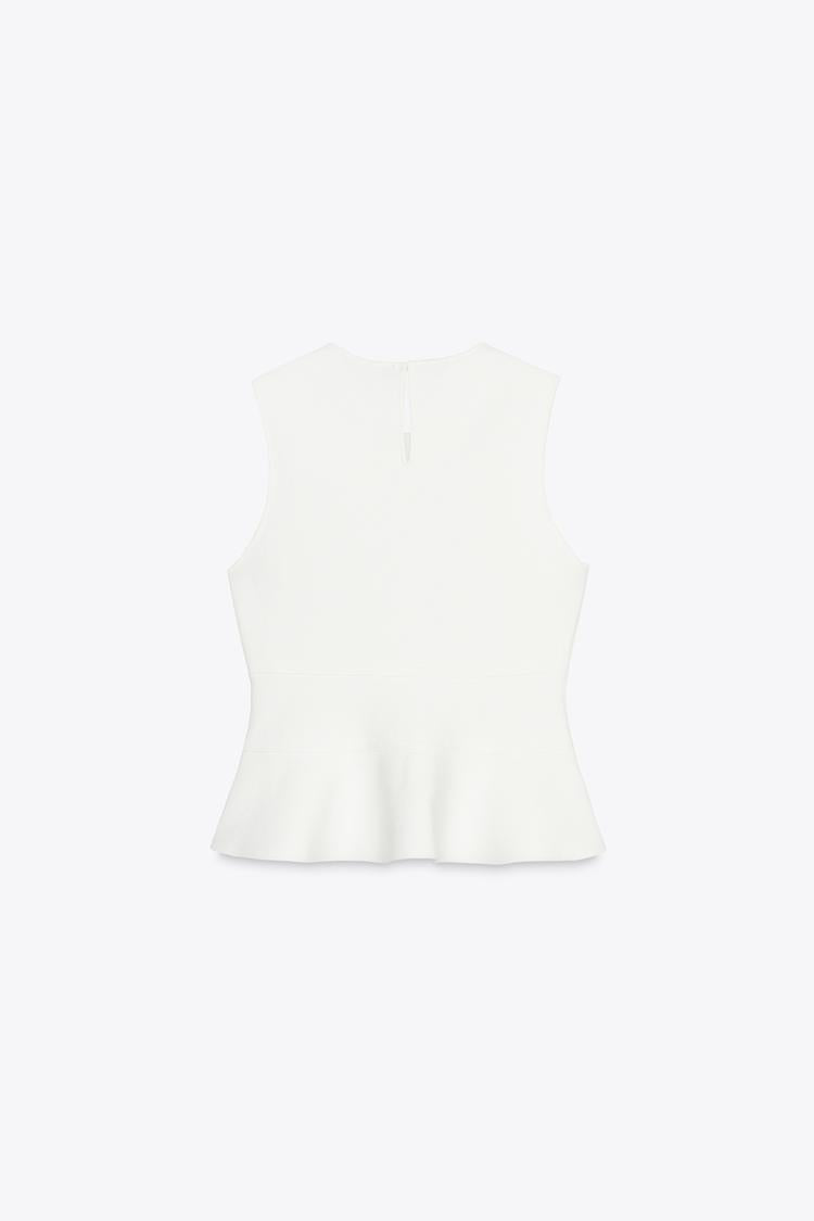 TOP EN MAILLE PÉPLUM AVEC LACETS